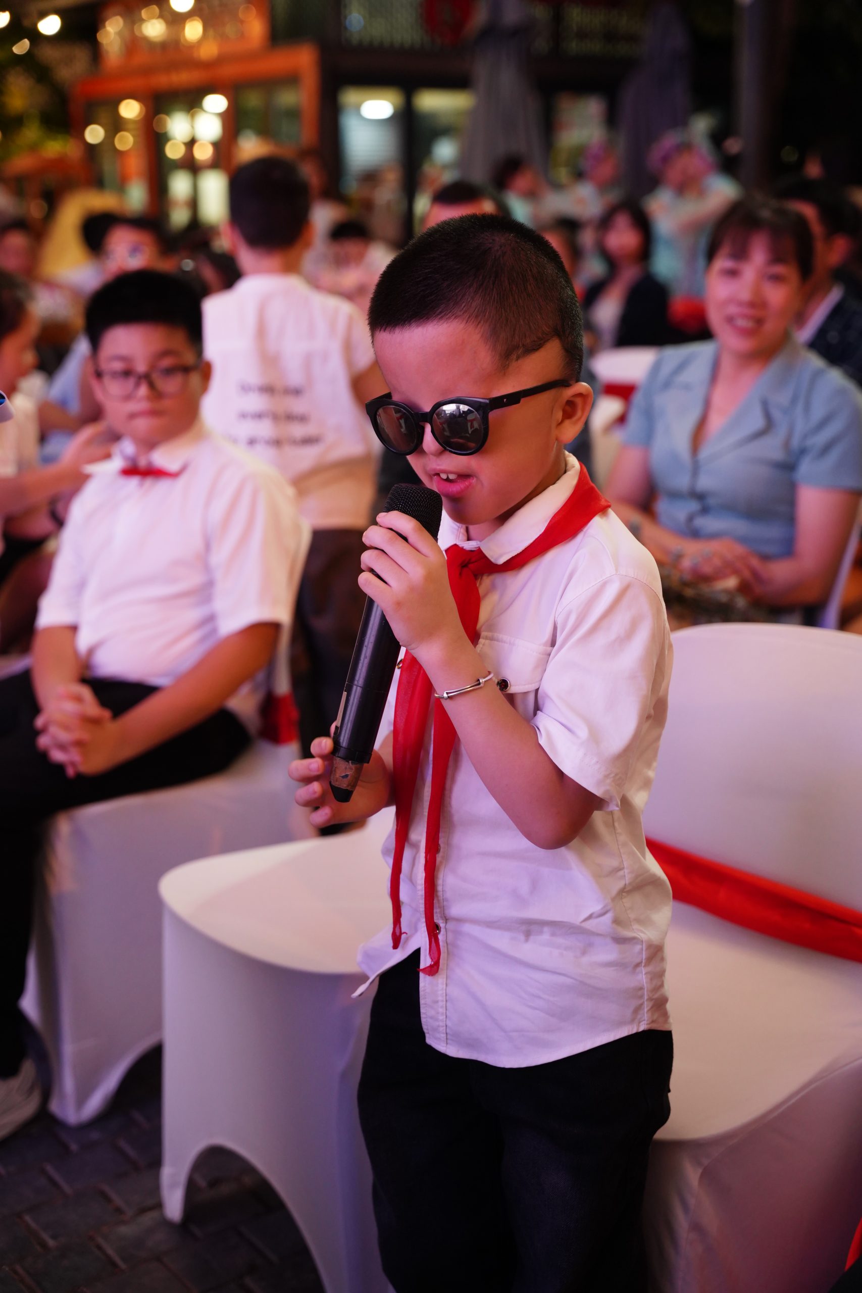 Hai Nam – the one who held my hand and asked, “What’s your name? I can’t see, but you’re very beautiful.” He confidently introduced himself and thanked all the audience during his own performance – a remarkable boy. I held Hai Nam’s hand as he stepped off the stage and told him just that. He only smiled.