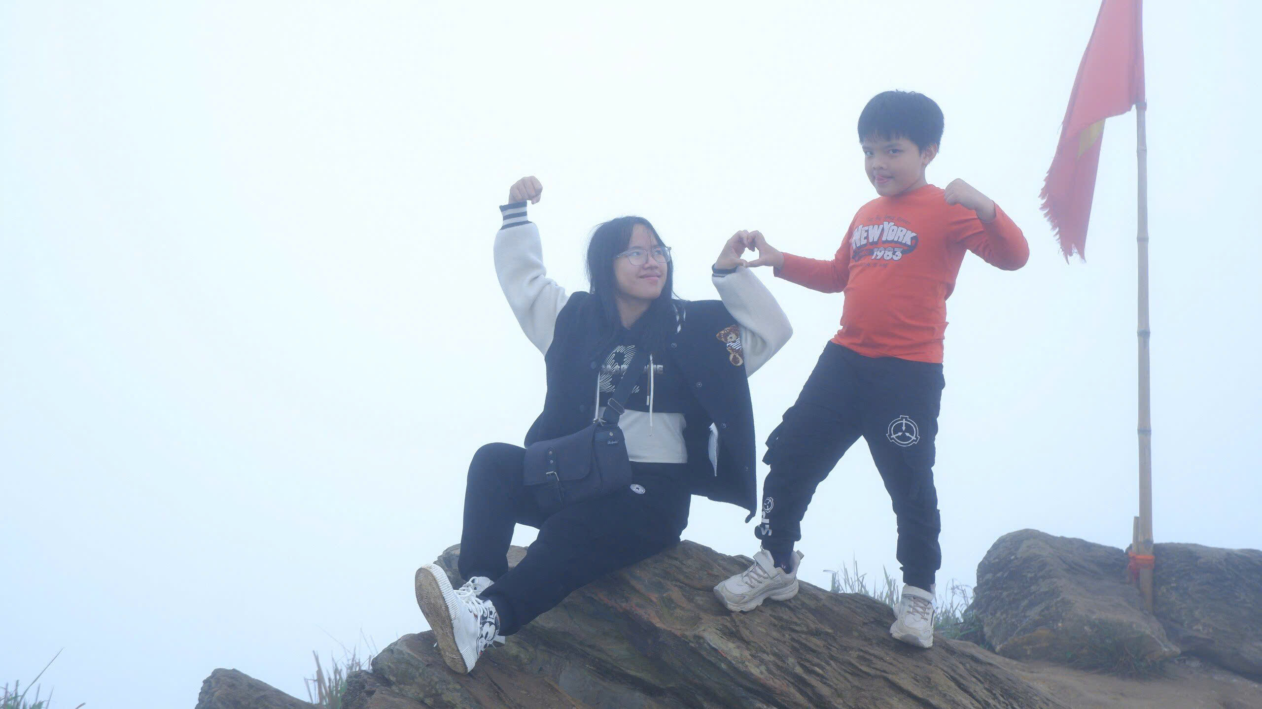 This is me and my younger brother, a long time after he learned to walk and talk, a long time after he didn’t need me to look after him anymore. He went hiking with me and struck a pose for the photo like an Avenger.